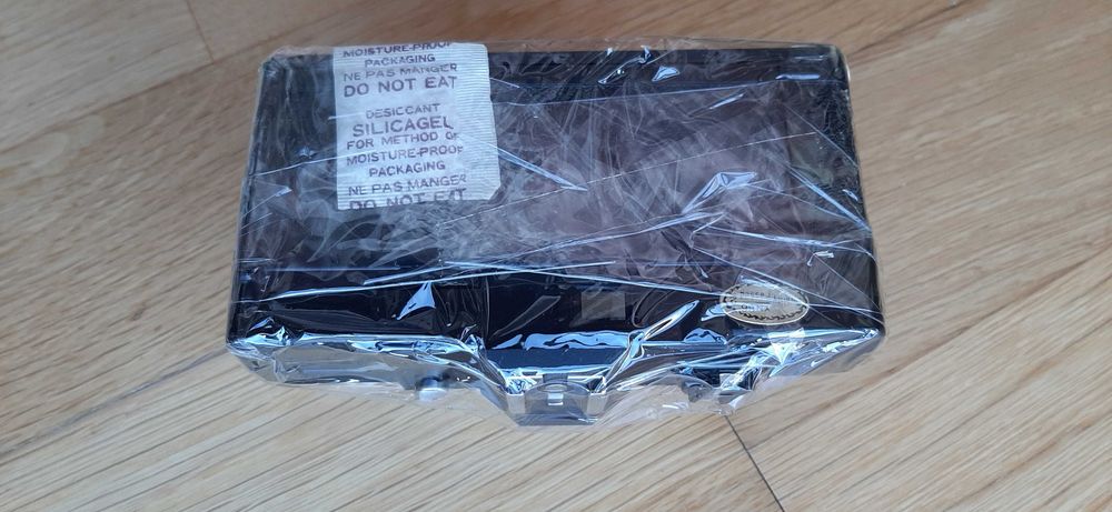 Máquina fotográfica de rolo 35 mm (LEO 35)