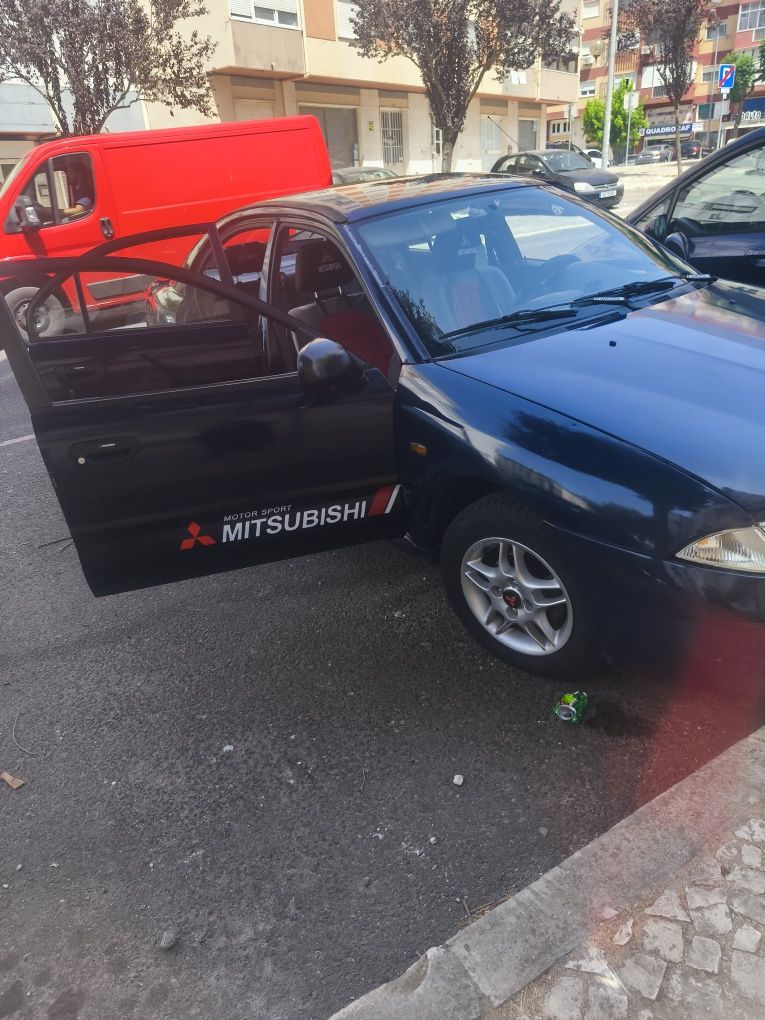Mitsubishi carisma Hatchbac 98-228.008kms/101cv/1600cc-2 DONOS
