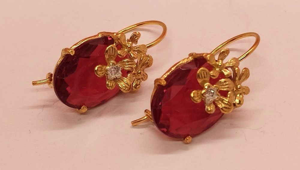 Brincos em prata dourada