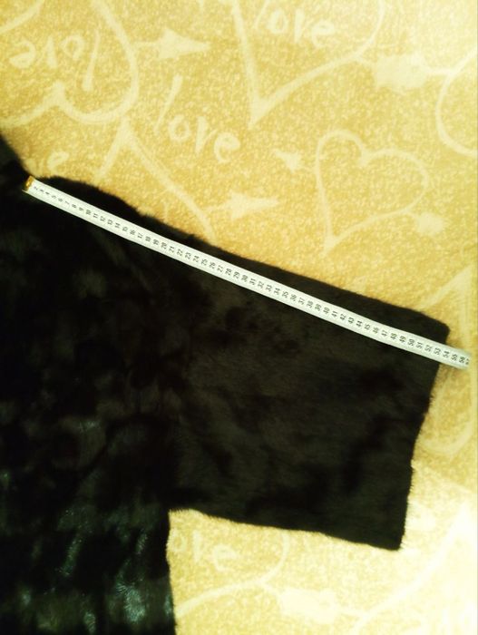 норкові шуби дві