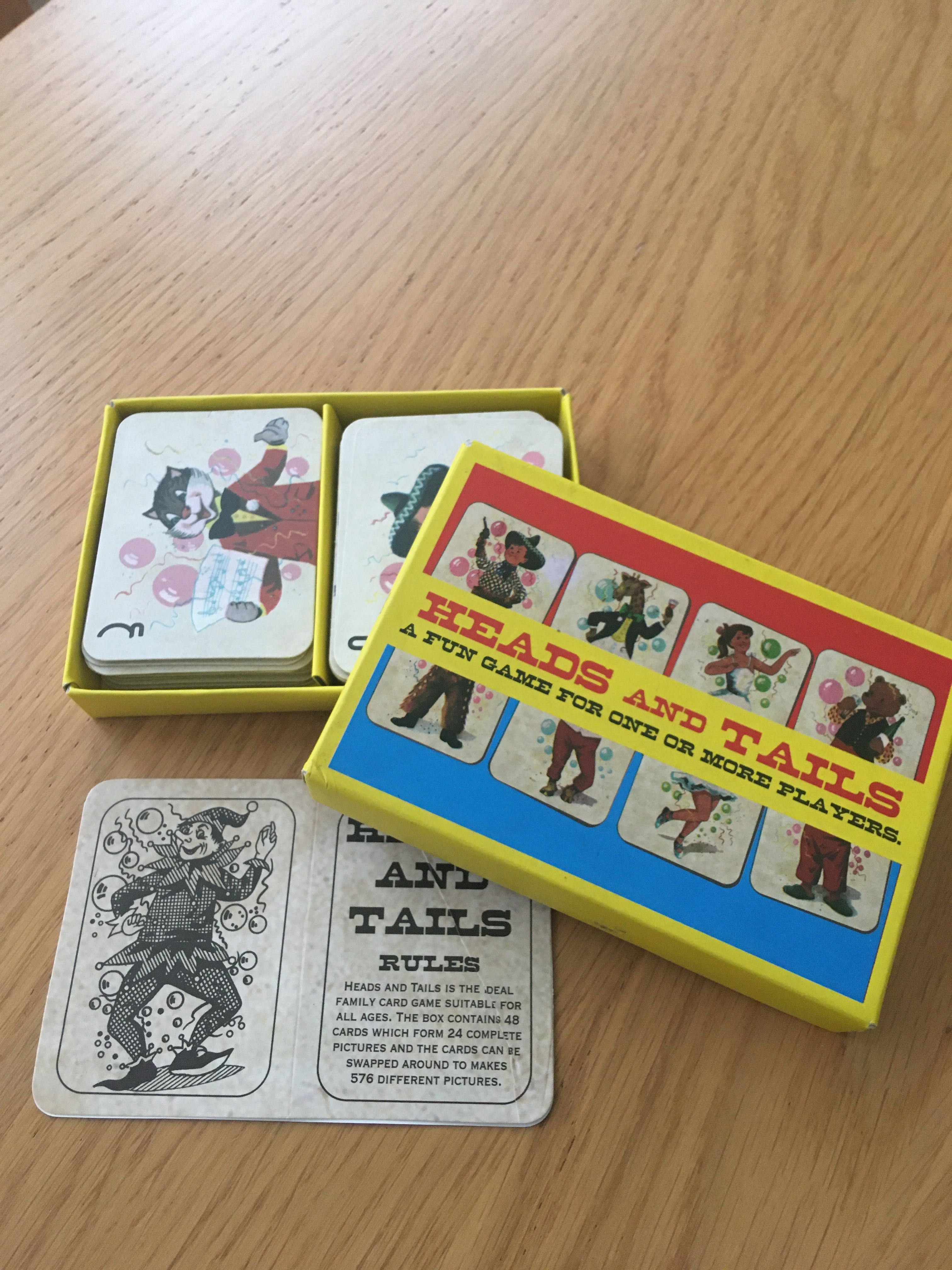 Jogo de cartas “Heads and Tails”