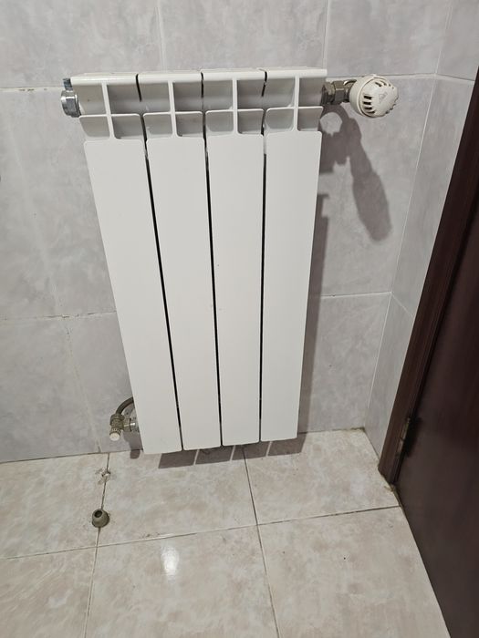 Quatro Radiadores de aquecimento