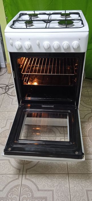 Газова плита б/в Indesit 50/60 поджигом духовка газова грилем вертелем