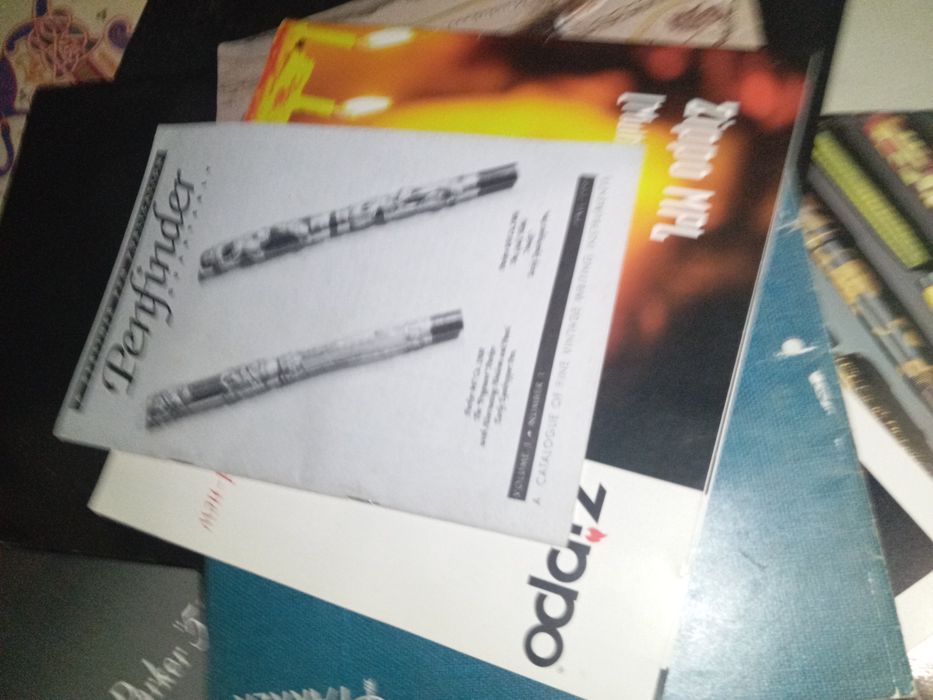 Lote de revistas da Zippo e Parker