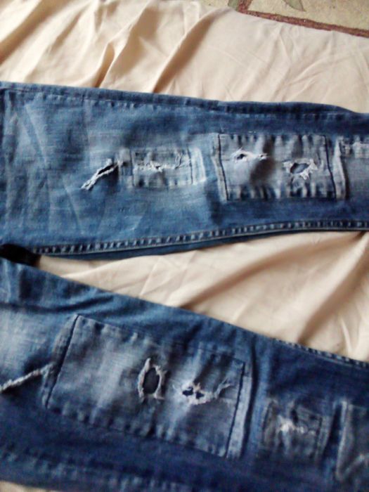 Jeansy przetarte