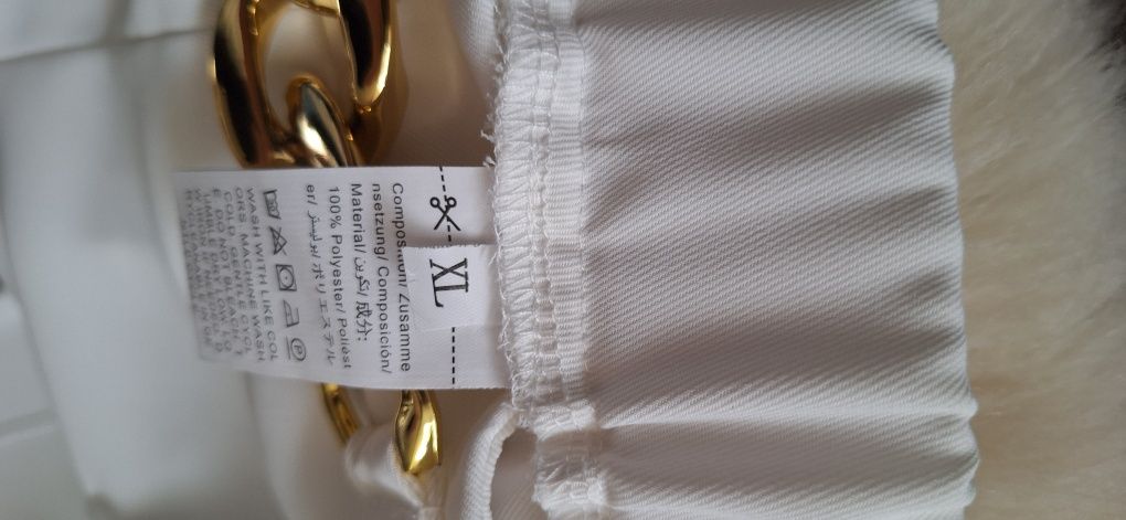 Szerokie spodnie eleganckie XL kremowe