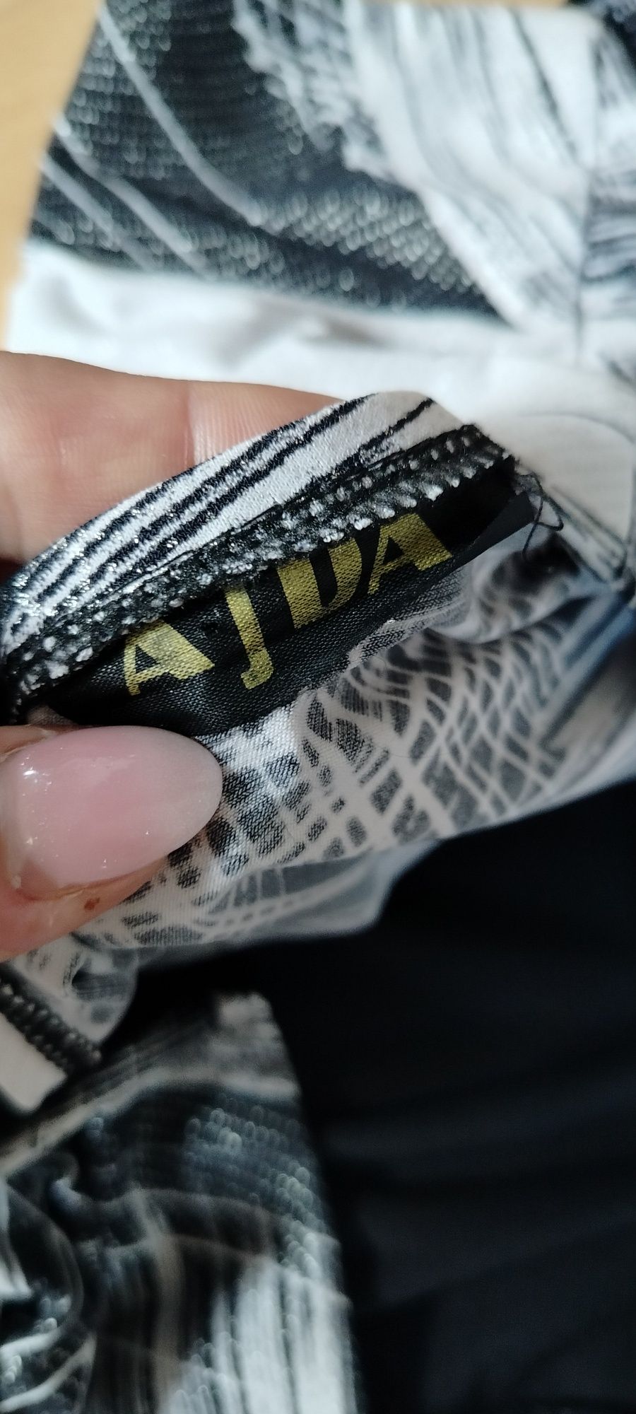 Śliczna Sukienka błyszcząca Ajda 48 stan jak nowa