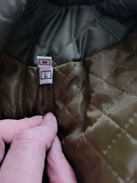 Осіннє стьобане пальто міді