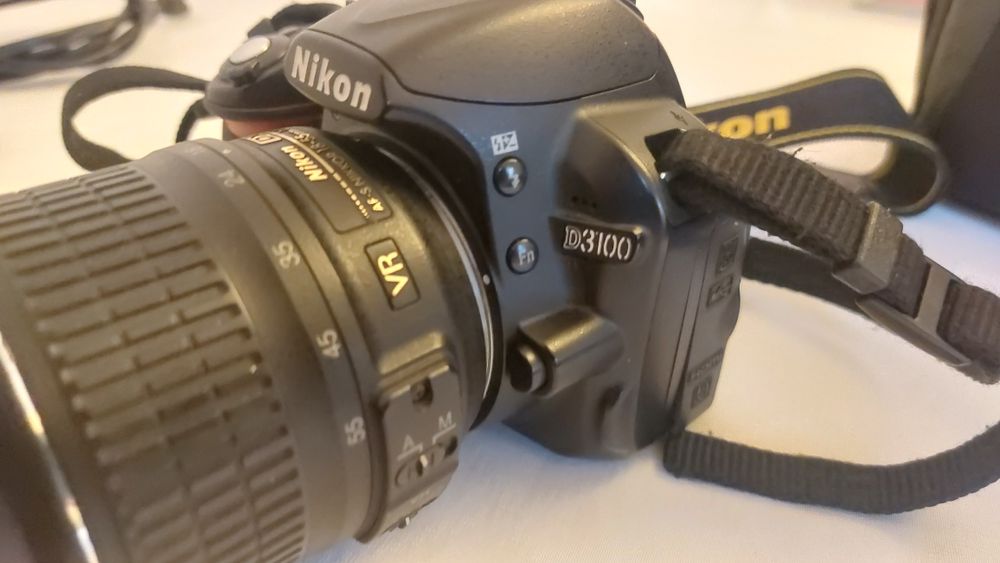 Nikon D3100 + objectiva + mala lowepro