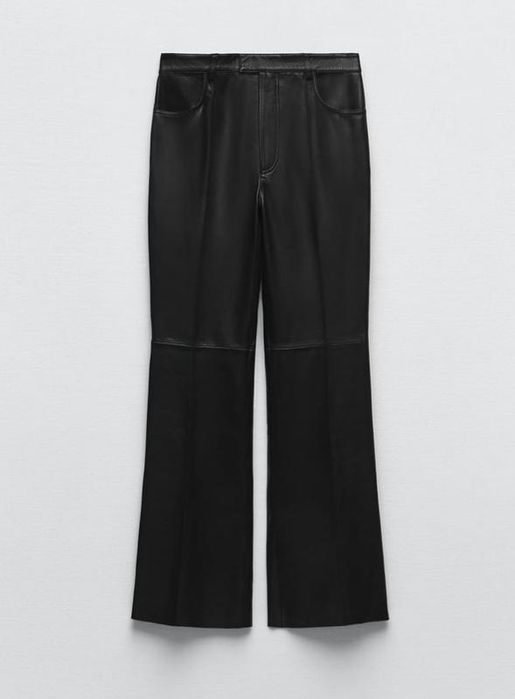 Шкіряні штаны чорного кольору з кишенями