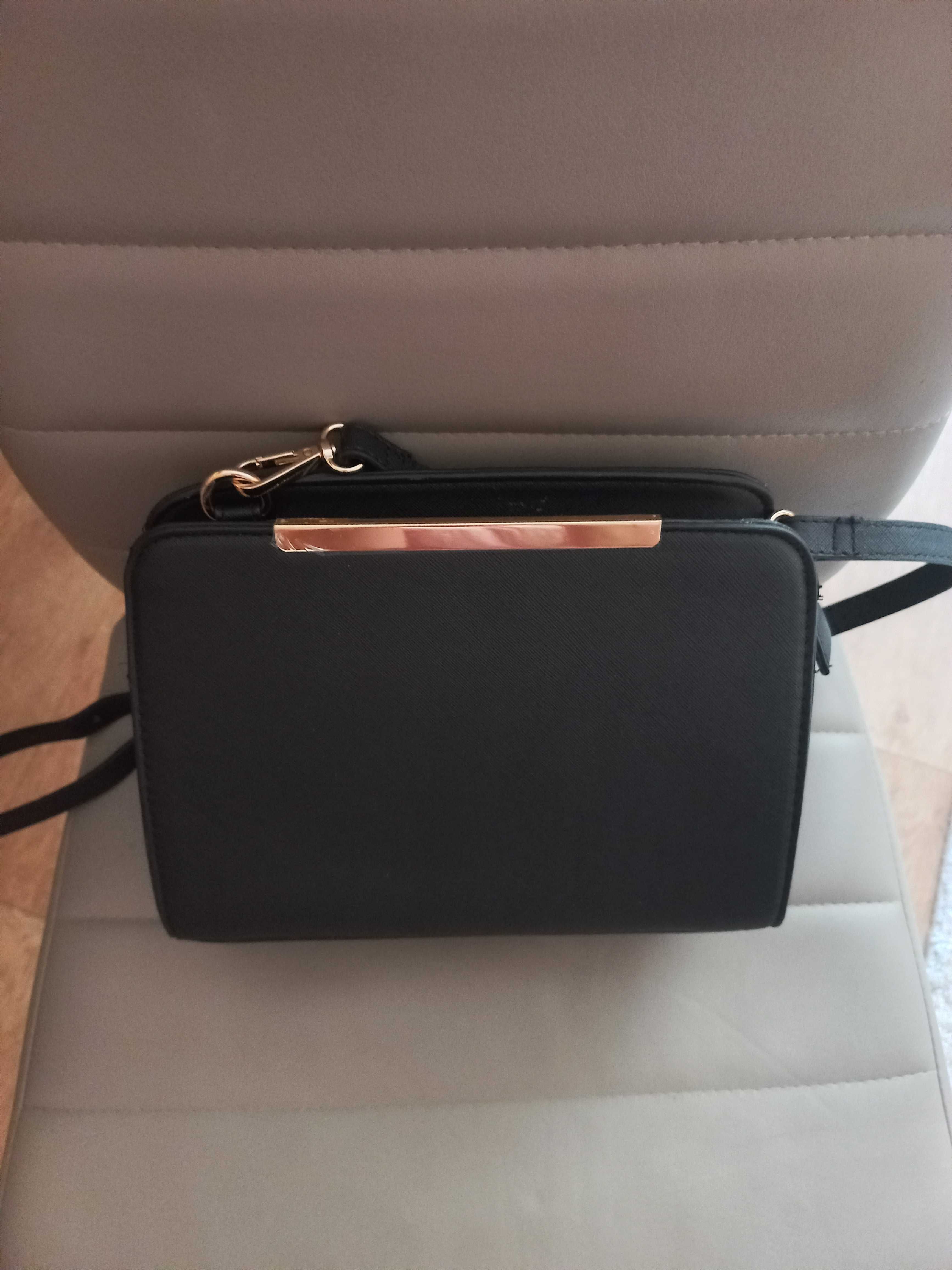 Жіноча сумочка чорного кольору