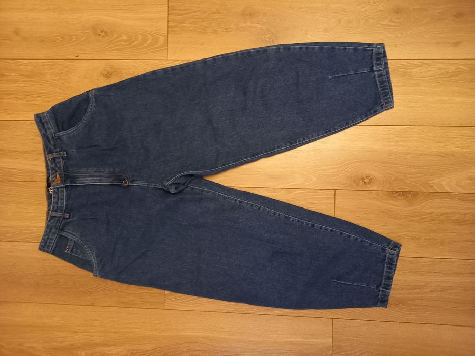 Granatowe jeansy 42