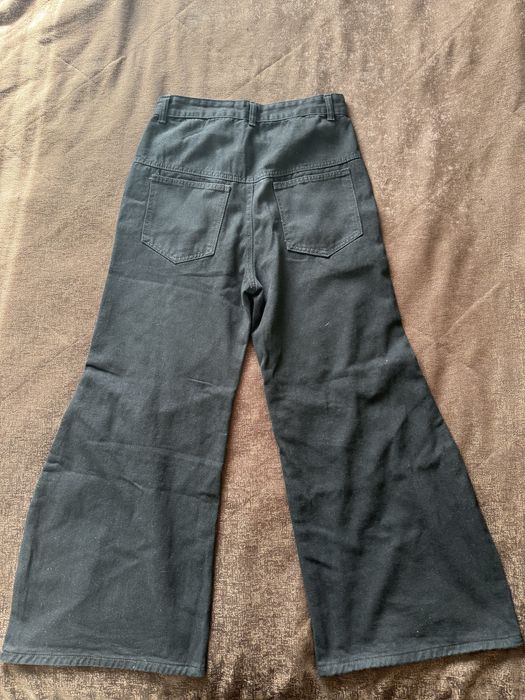 Чорні кльош брюки