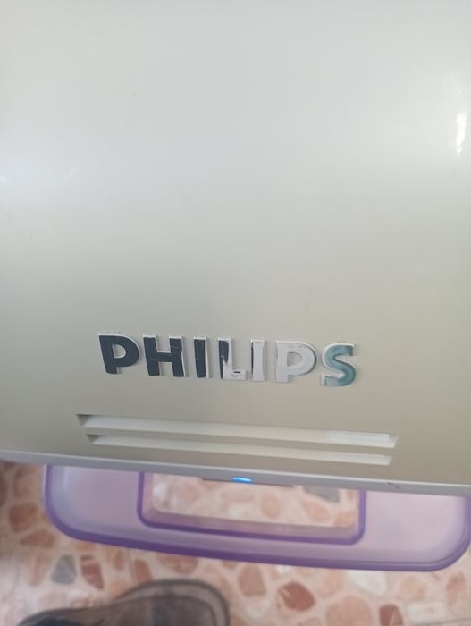 Tábua de passar a ferro elétrica PHILIPS.