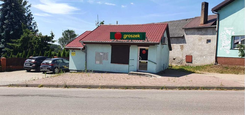 Działka zabudowana budynkiem usługowym (sklep)
