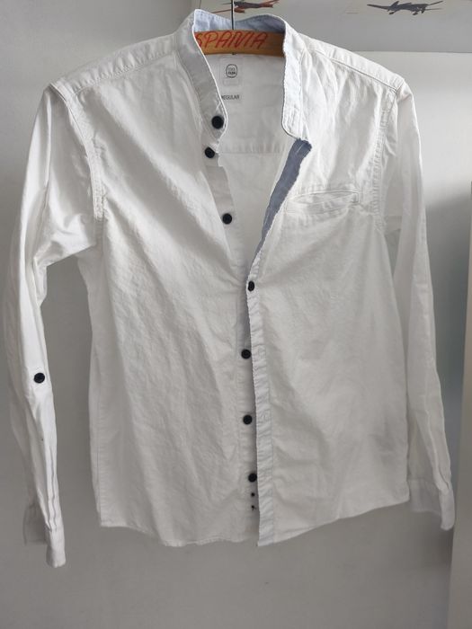 Biała koszula bardzo fajna