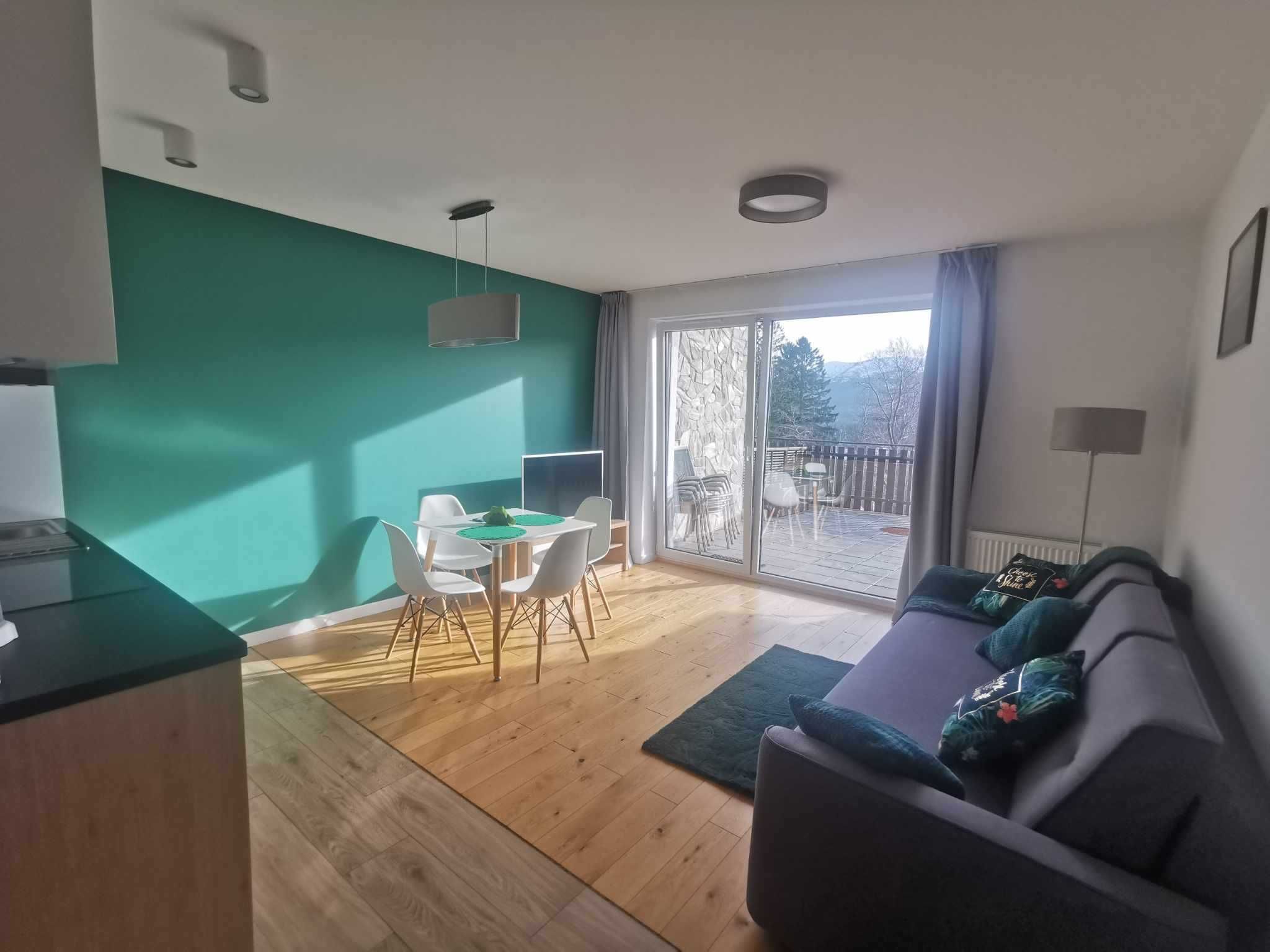Apartament z tarasem i pięknym widokiem.