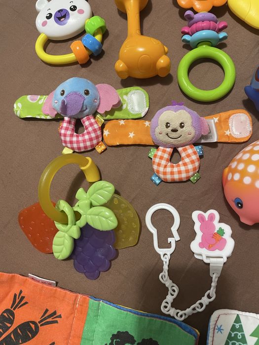 Іграшки для новонароджених. Гризунці. Брязкальця. Кліпса для соски.