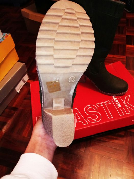 Botas cano alto verde da marca Drastik