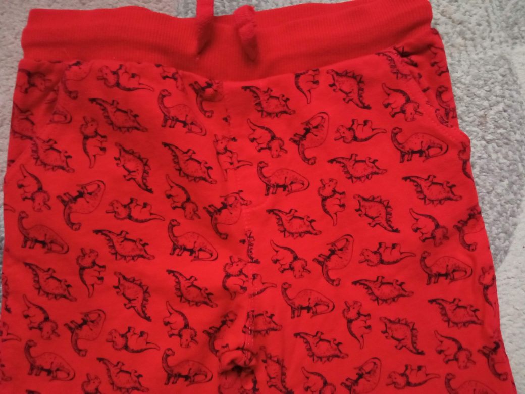 Czerwone spodnie dresowe z dinozaurami, nieocieplane Sinsay 128-134