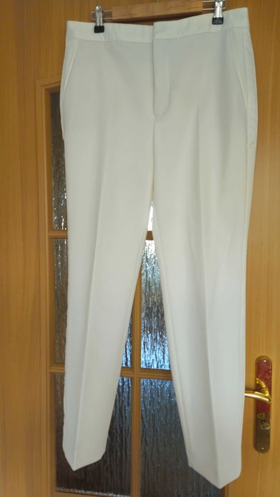 Białe eleganckie spodnie Zara