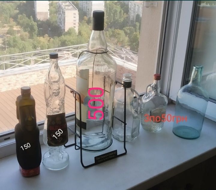 Бутылки стеклянные с крышкой