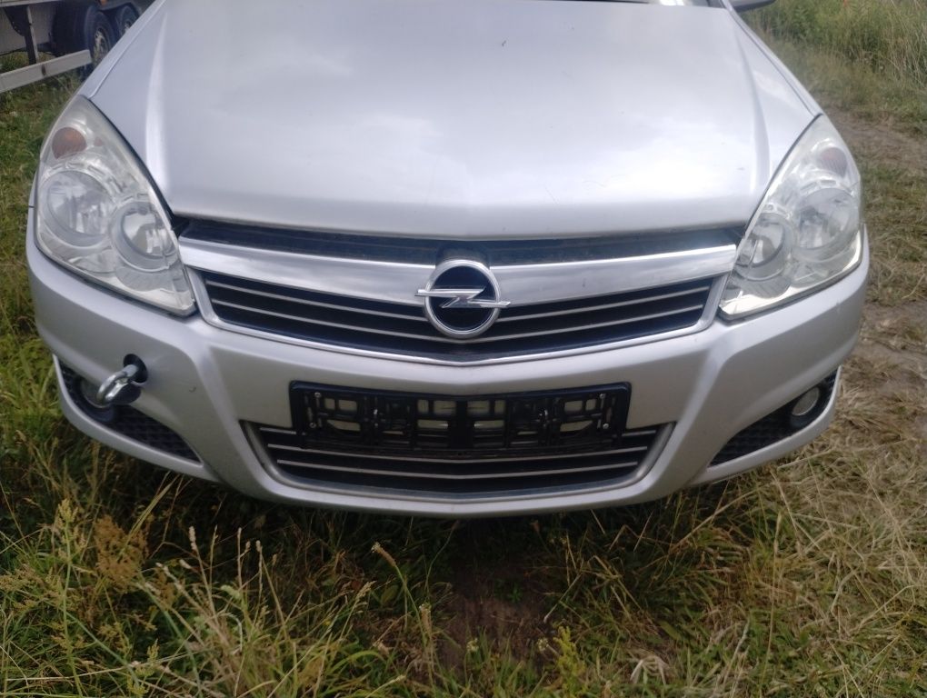 Opel Astra h III lampy  komplet przód lift