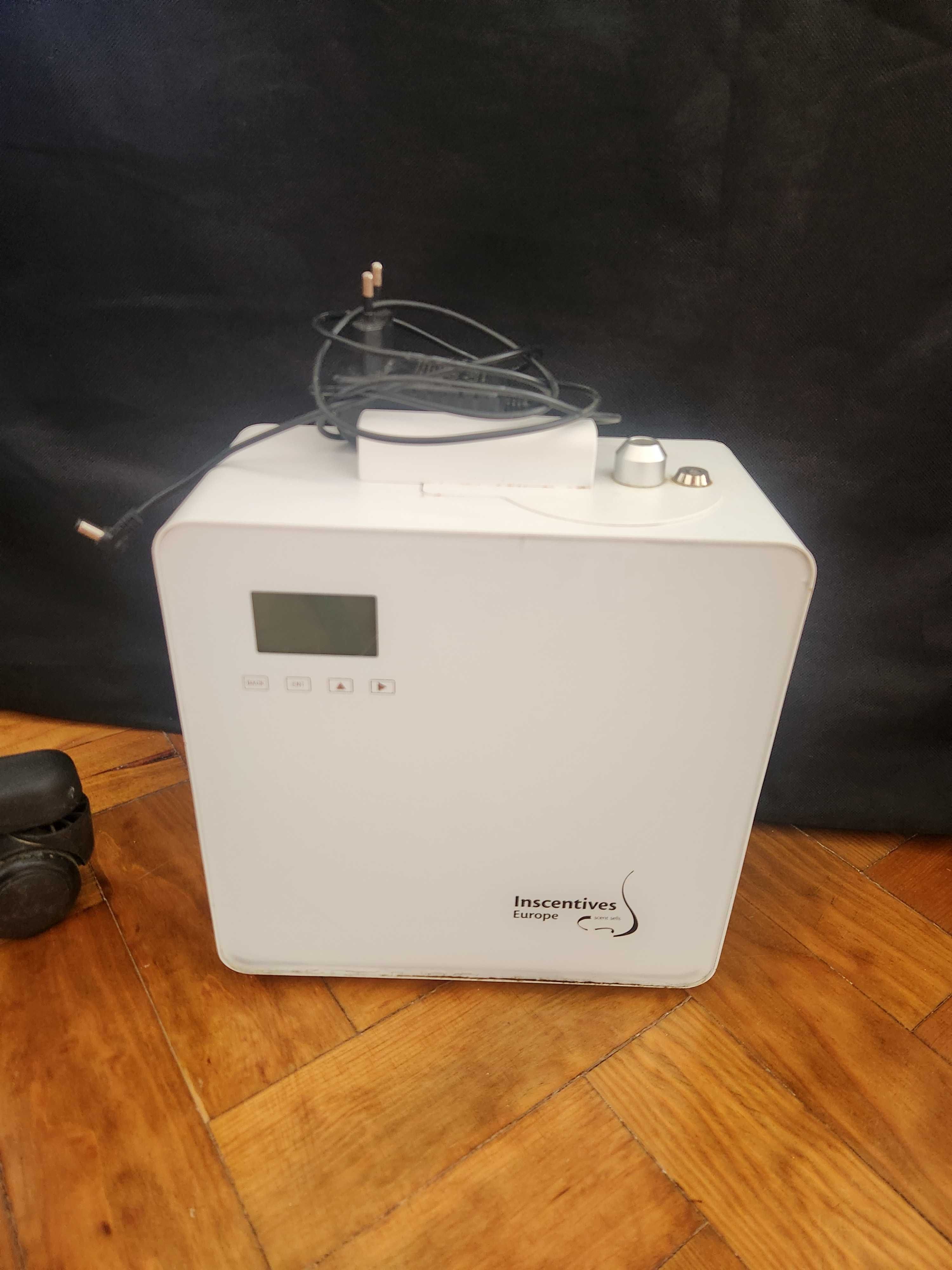 Mesa de massagem com assento giratório e difusor de óleo