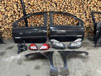 Дверка права ліва Renault Clio 3 КУПЕ