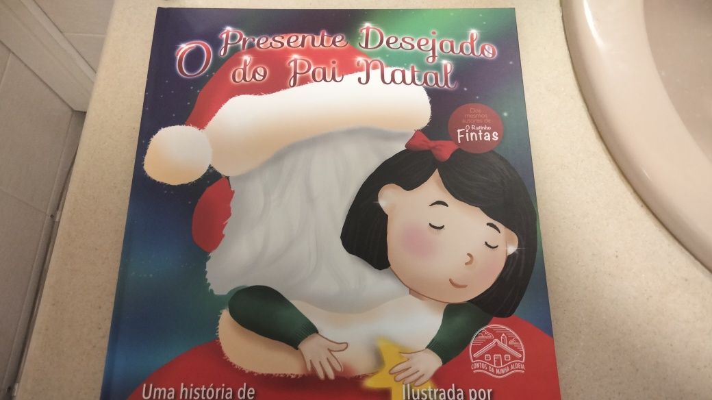 O livro " o presente desejado do pai natal"