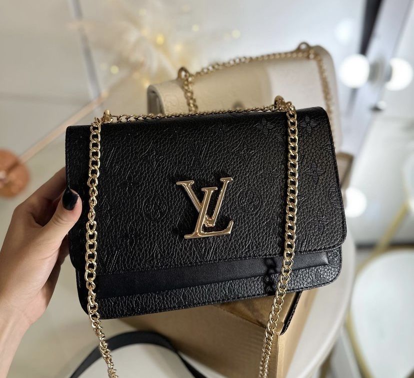 Жіноча сумочка Louis Vuitton.