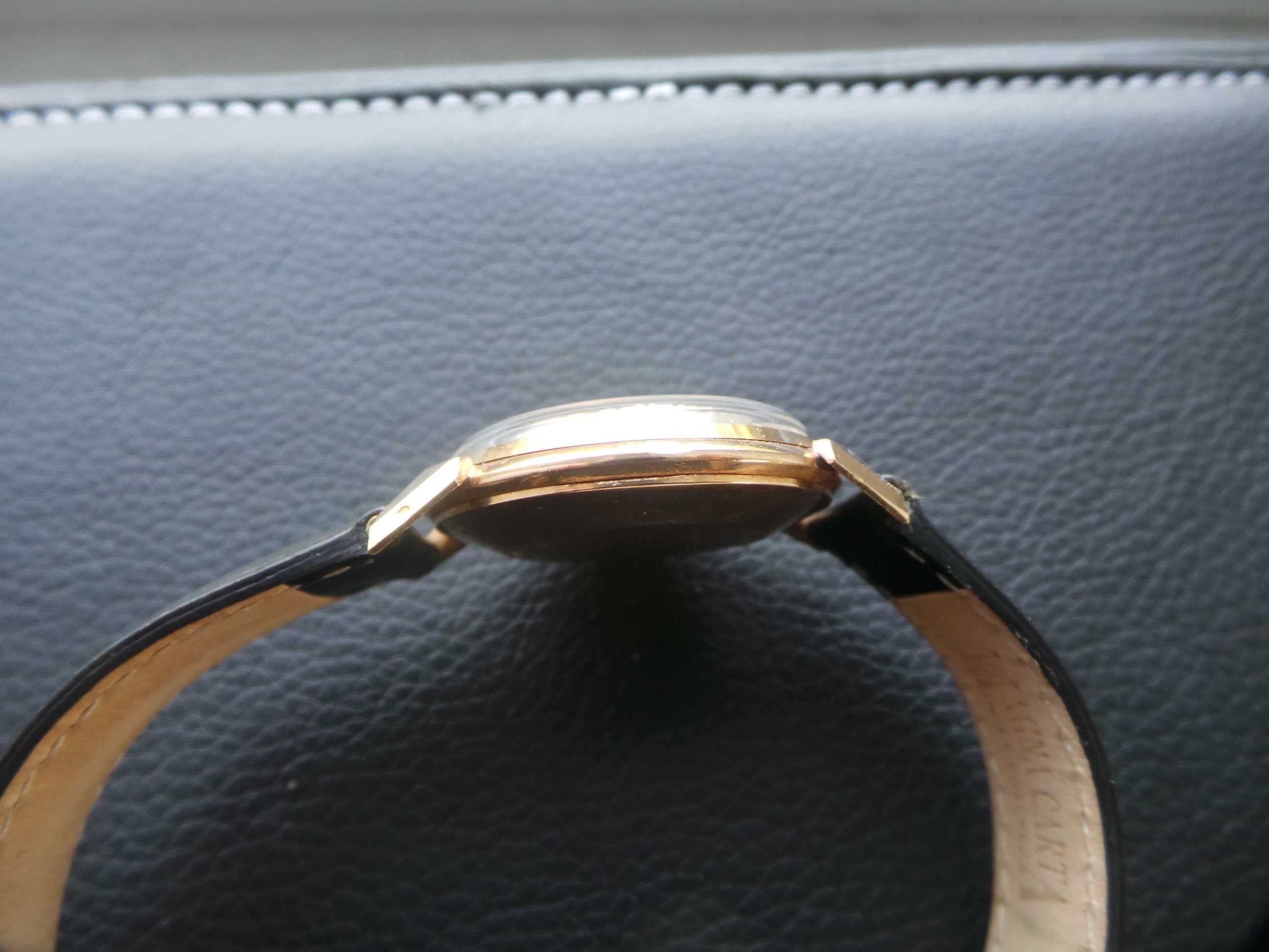 Złoty zegarek omega automat 18k