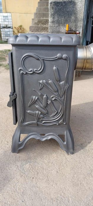 Vendo salamandra muito antiga em ferro  fundido