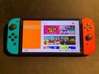 Nintendo Switch OLED stan bdb + 2 gry + akcesoria