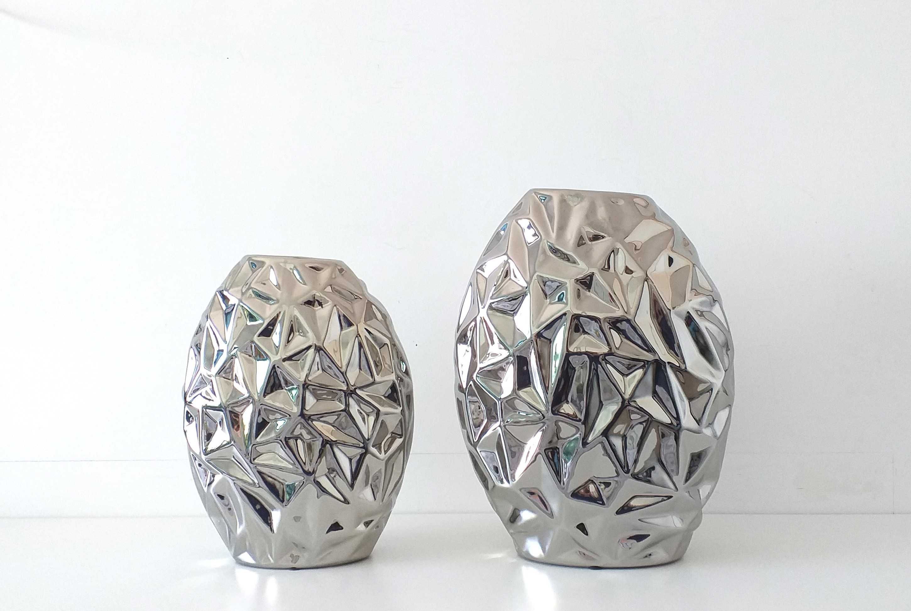 Peças decorativas em prateado  de grandes dimensões