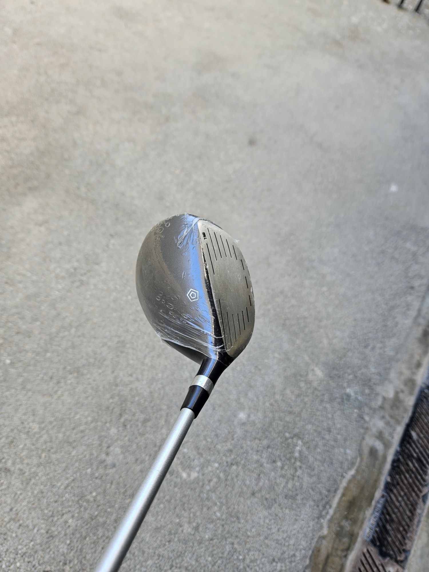 Taco de golfe novo