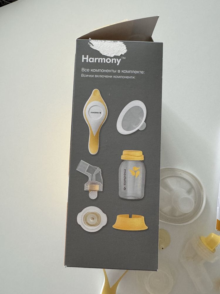 Молокосос Medela ручний + пакети для молока