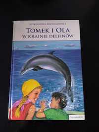 Książka "Tomek i Ola w krainie delfinów".