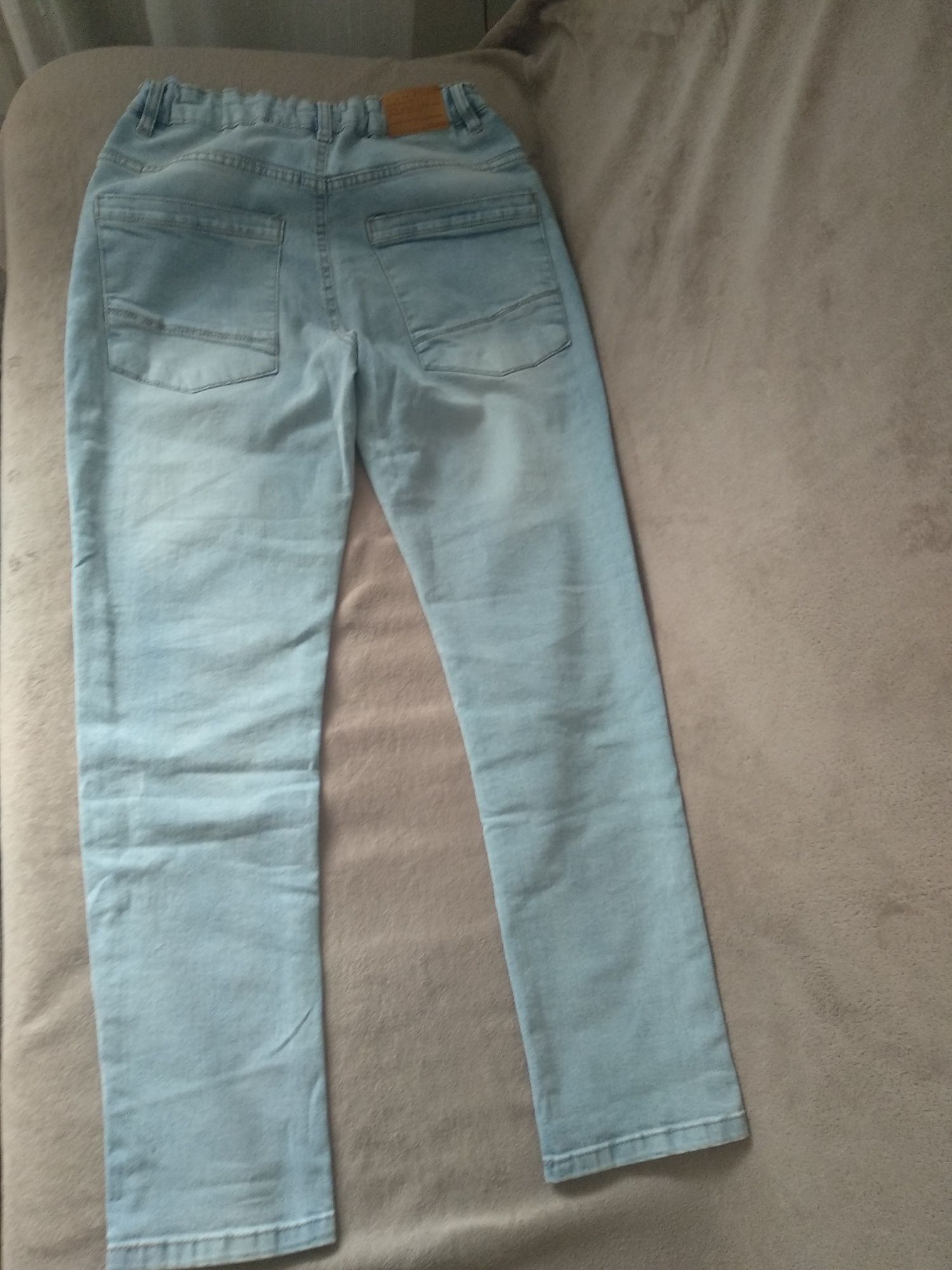Spodnie jeansowe chłopięce firmy Reserved rozmiar 164