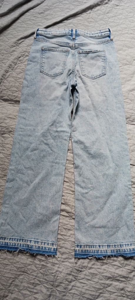 Dżinsy wide leg z przetarciami