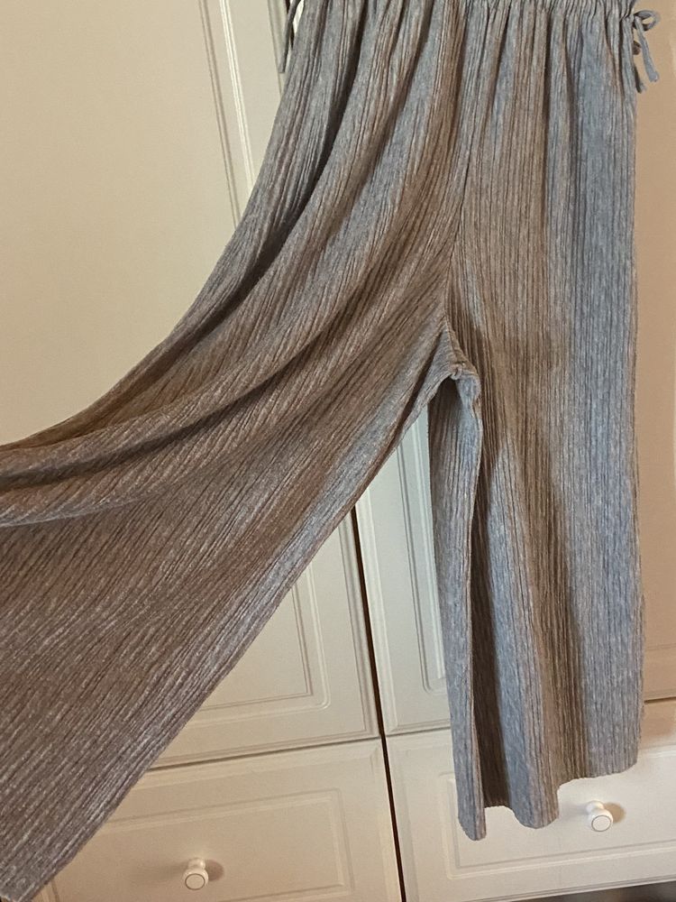 Macacão cinzento da zara