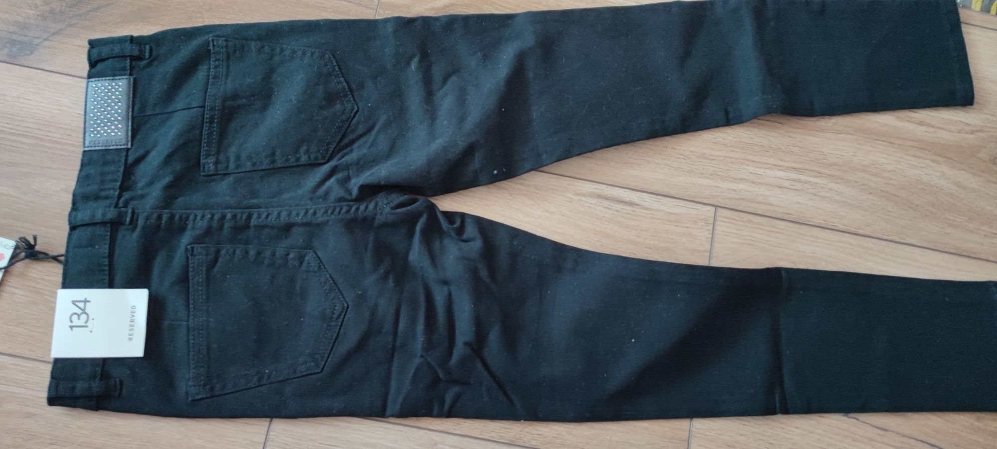 Spodnie 134 jeansowe dziewczęce Reserved czarne