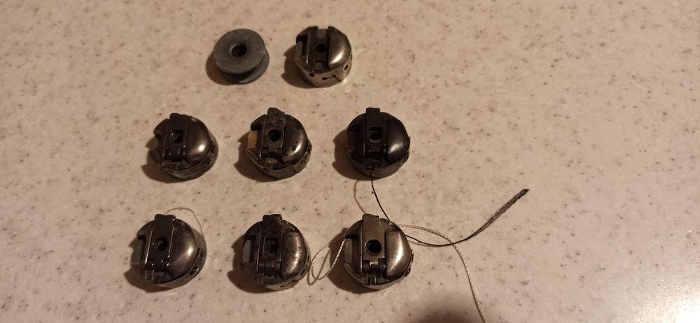 Шпульки, шпульні ковпачки, голки до швейних машин