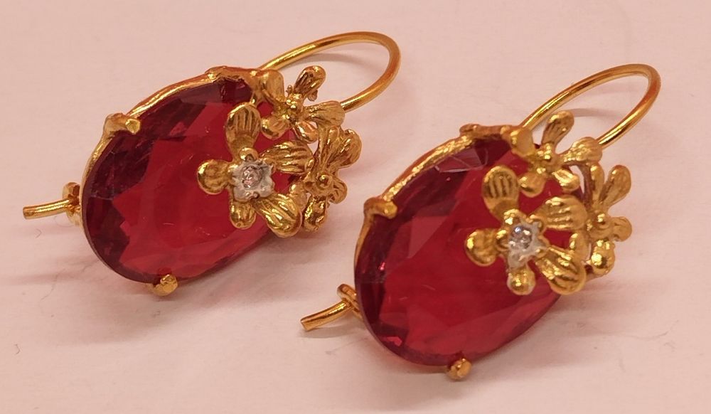 Brincos em prata dourada