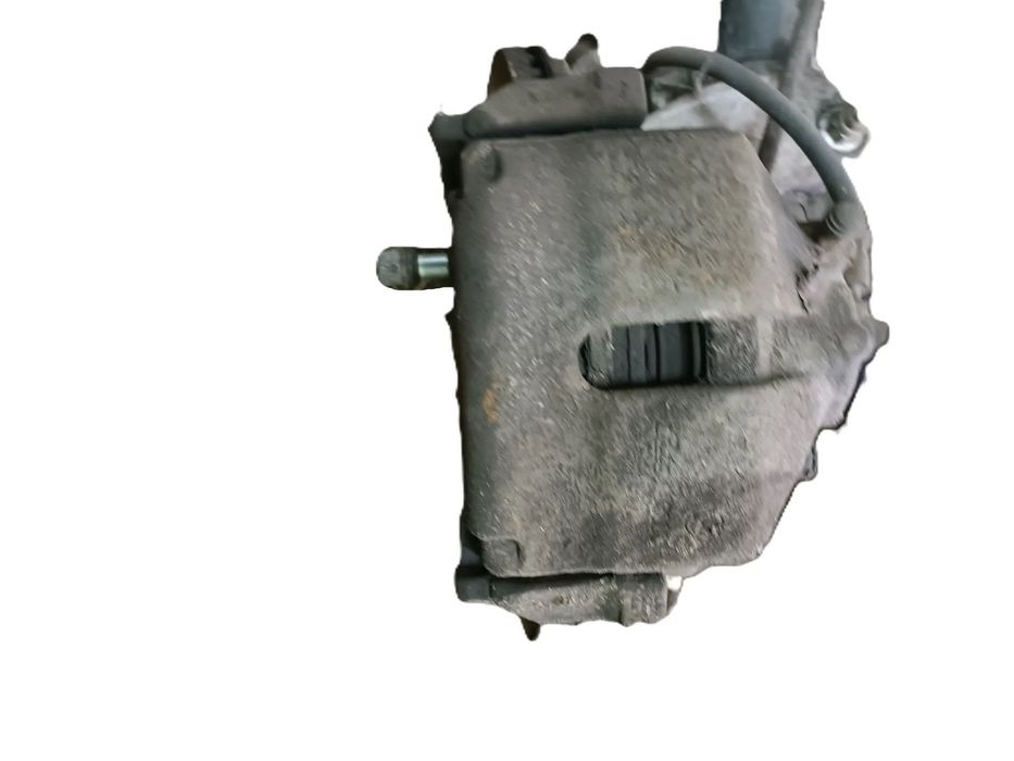 VOLKSWAGEN PASSAT B6 05-10 r. 2,0 TDI ZACISK HAMULCOWY z JARZMEM prawy przód PP +