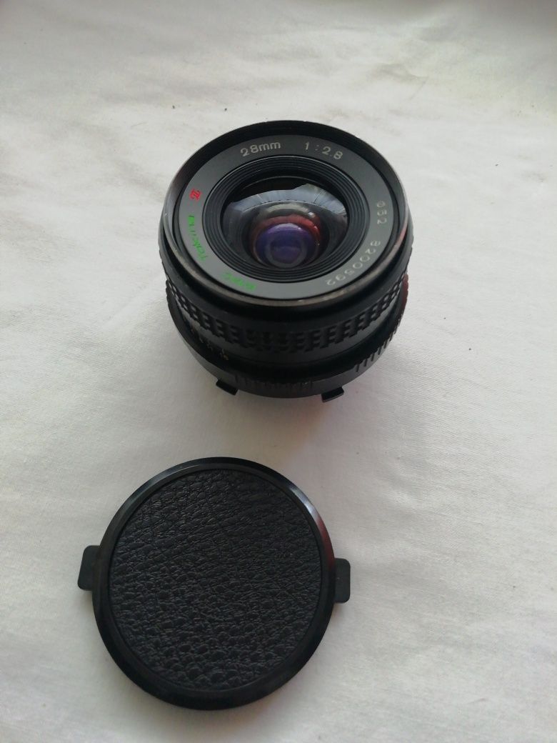 Vendo Objetiva Tokina RMC 28 mm 1:2.8 para maquinas fotográficas analó