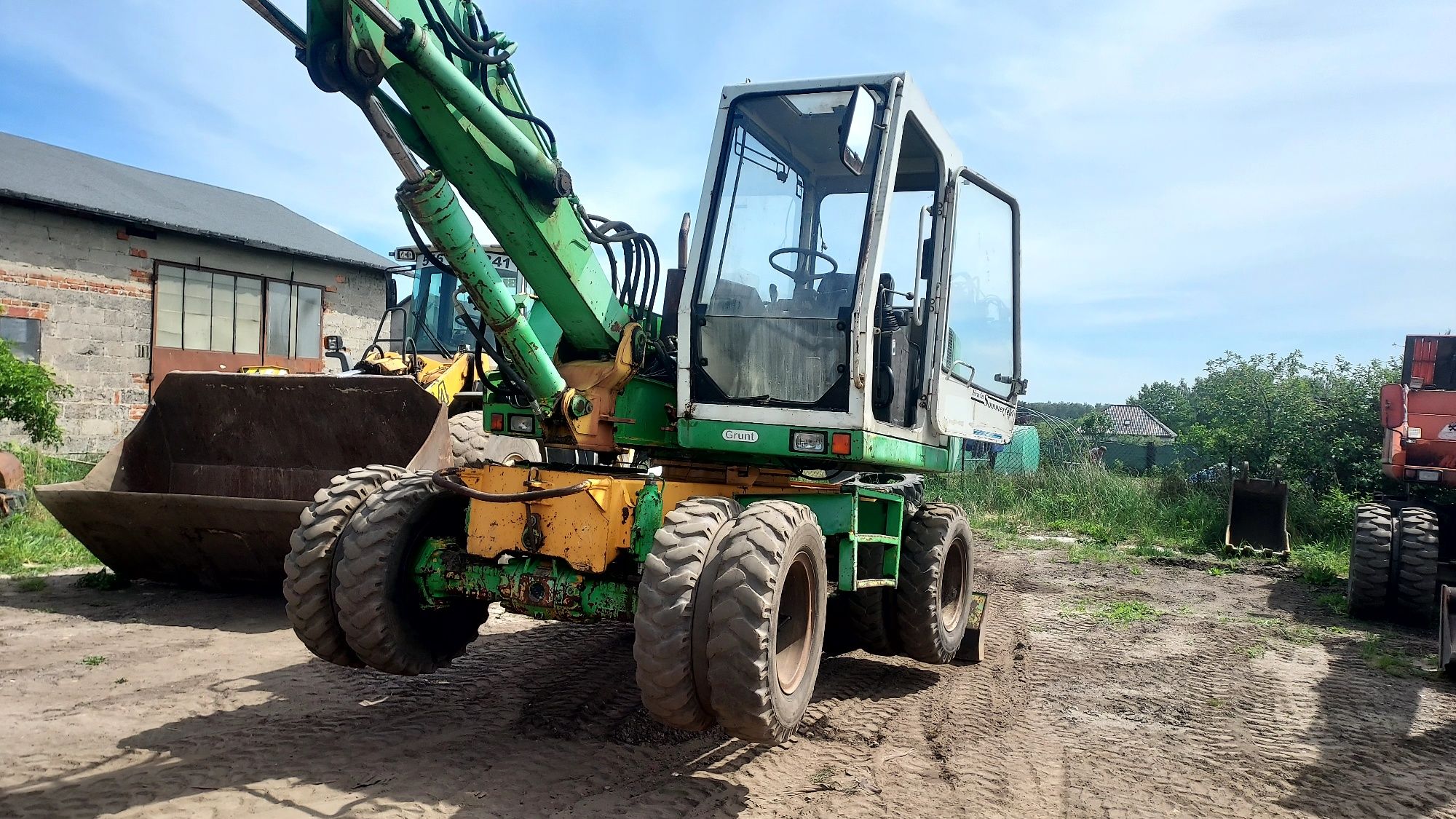 liebherr 310 cena brutto koparka kołowa cat komatsu terex zamienię