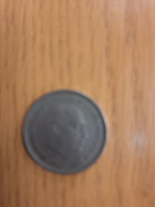 Moeda rara de 50 pesetas de 1957 estrela 58 do ditador Franco