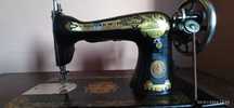 Máquina de costura Singer, com Móvel de origem