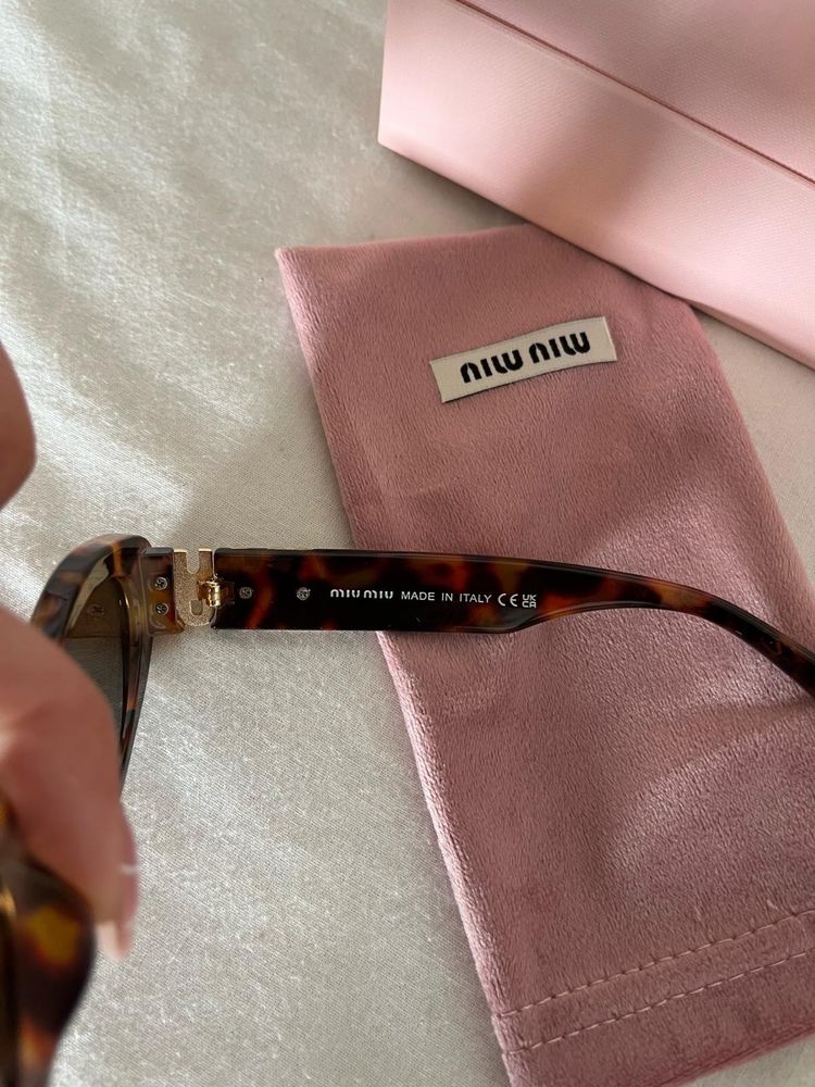 Oculos de sol miumiu